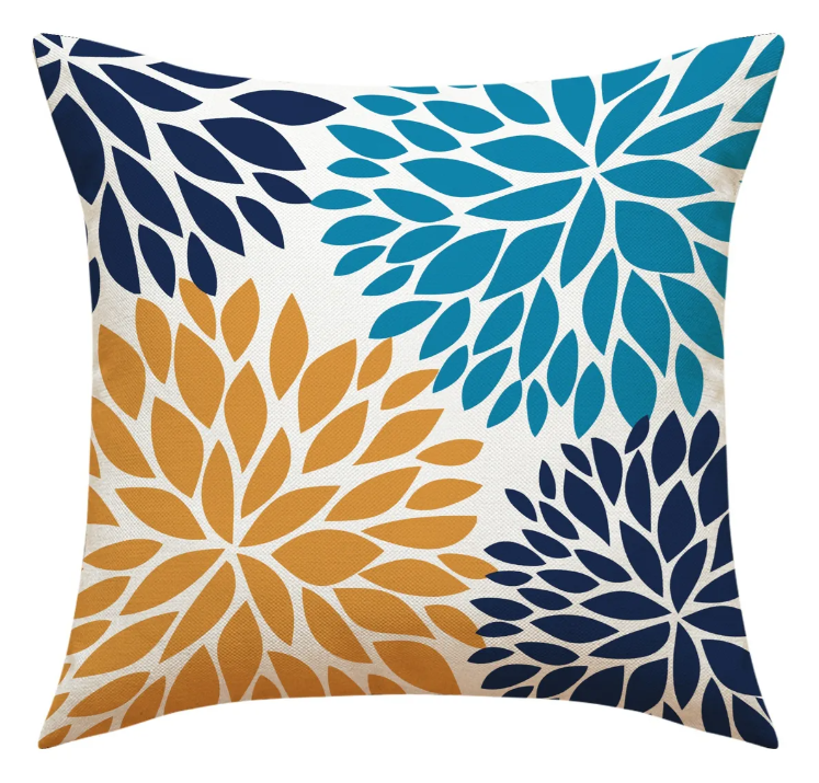 Fundas de cojín pétalos con diseño multicolor en tonos azul, mostaza y beige sobre tela tipo lino
