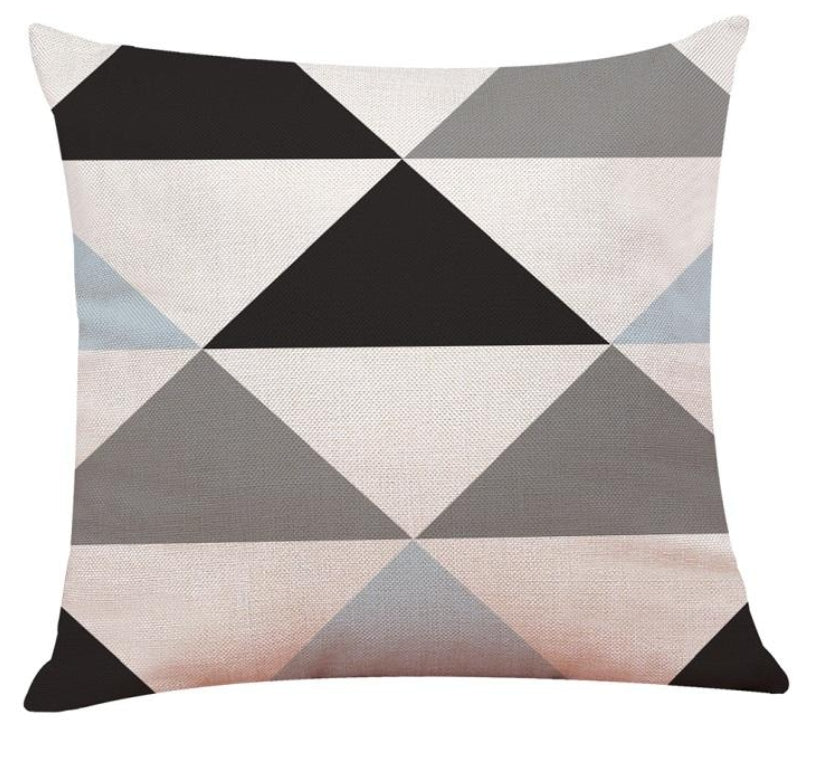 Funda de cojín geométrica en tonos gris, negro y beige estilo moderno